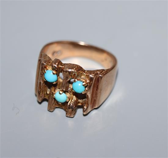 A 9ct gold turquoise-set modernist ring, size K.